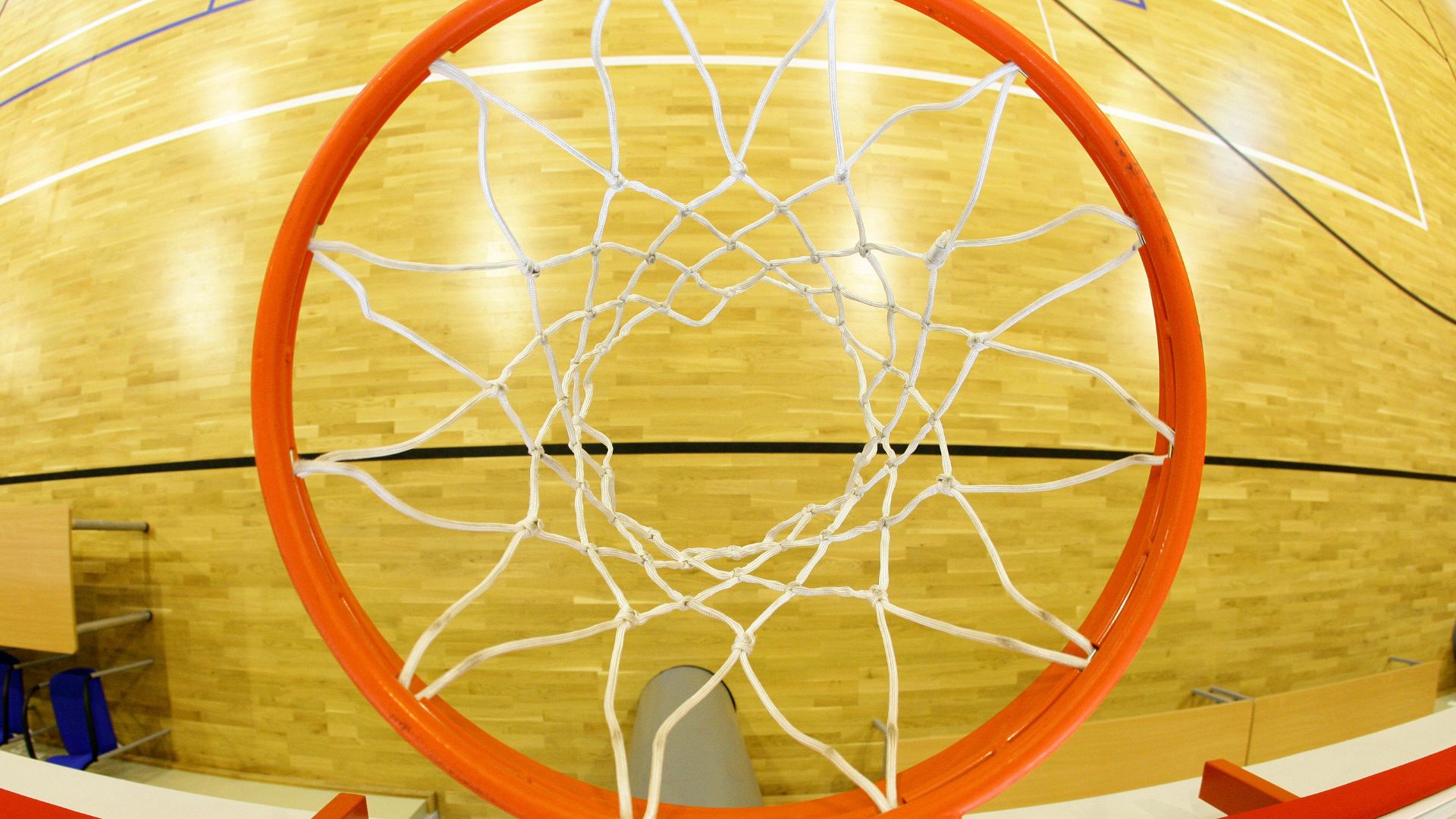 Cover photo of a yellow Basket Ball court and Hoop